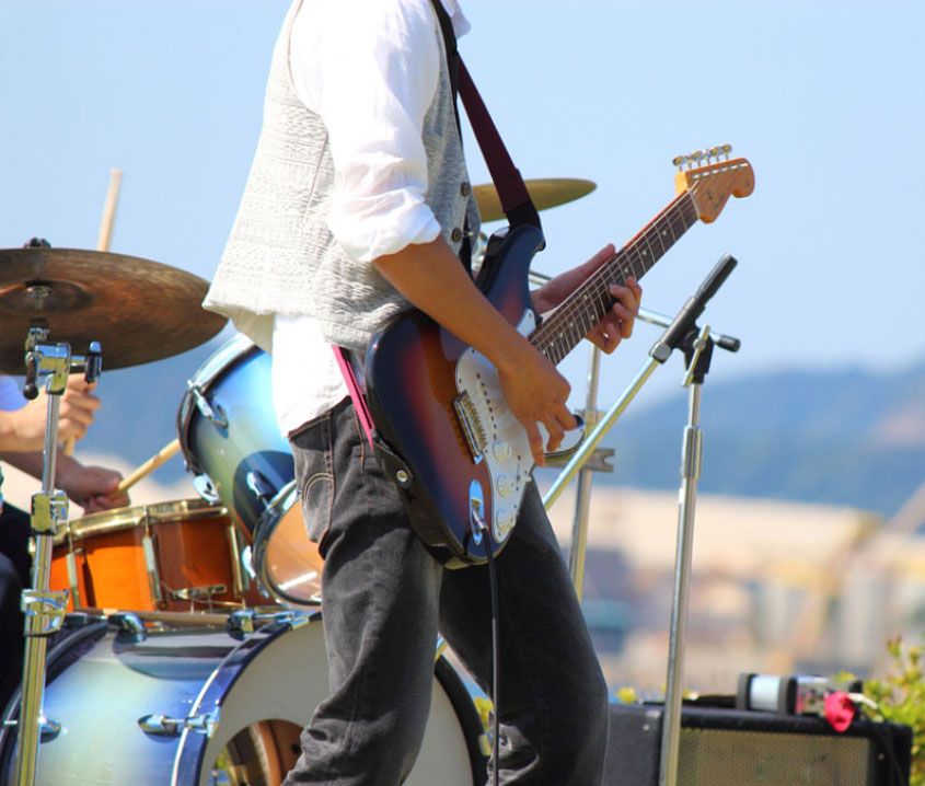 Man Playing Guitar